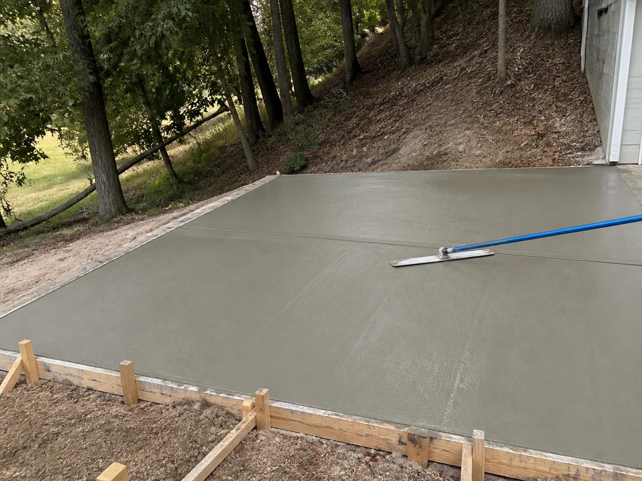 Fresh concrete repair on a sloped Pittsburgh driveway