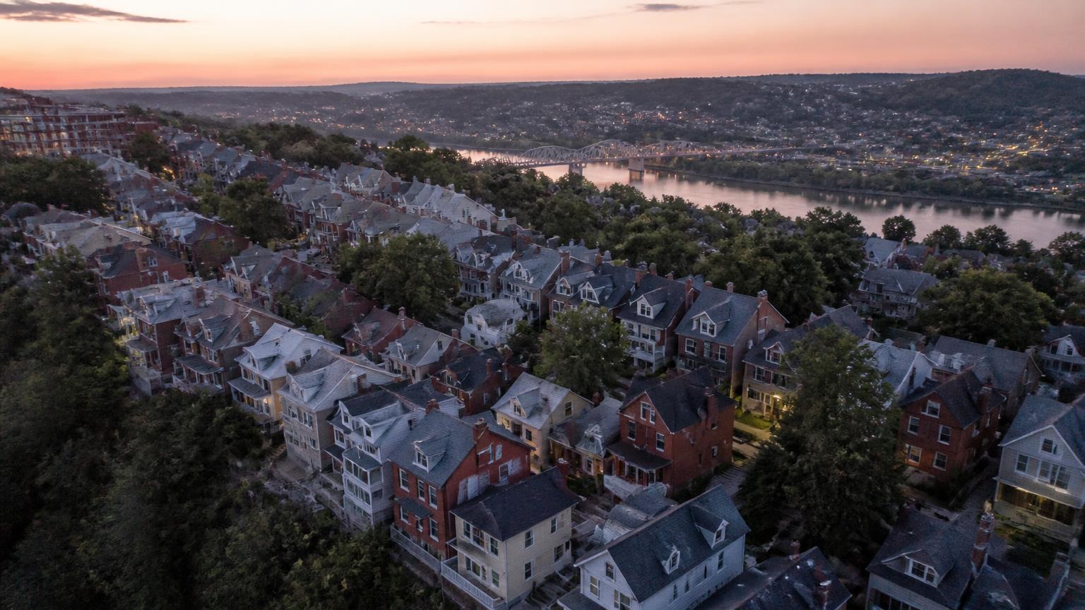 Pittsburgh rooftops along a ridge at dusk
