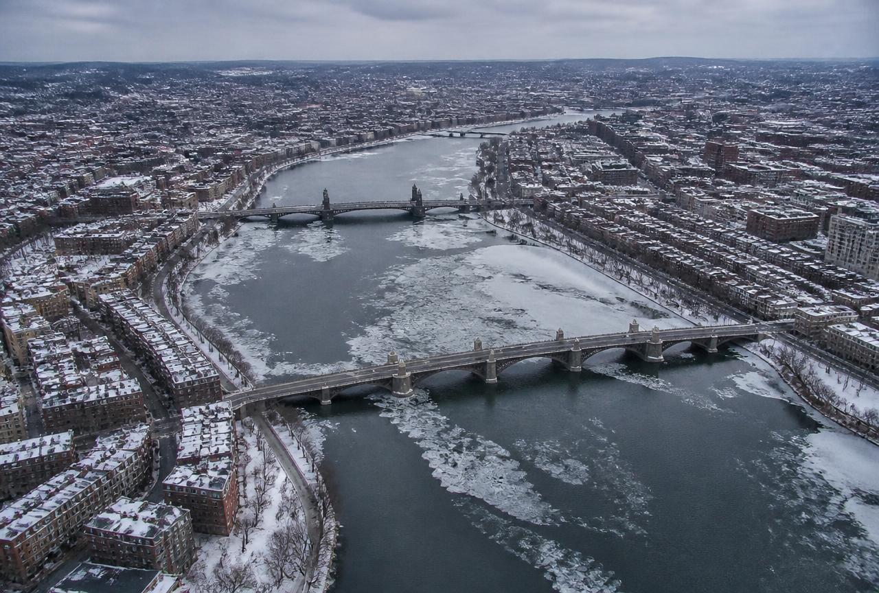 Aerial view of Albany's downtown skyline and surrounding Capital Region neighborhoods along the Hudson