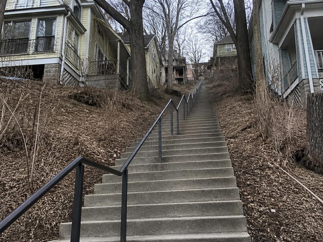 Steep city steps climbing a Pittsburgh hillside neighborhood