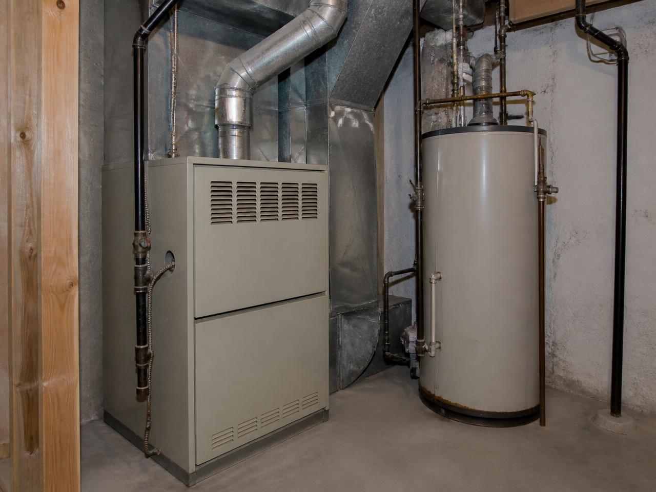Furnace tucked into a low-clearance basement mechanical space in Pittsburgh